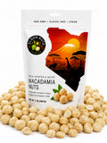 Elgon Nuts 1 oz roasted and salted macadamia nut pouch surrounded by whole macadamia nuts on a white background.