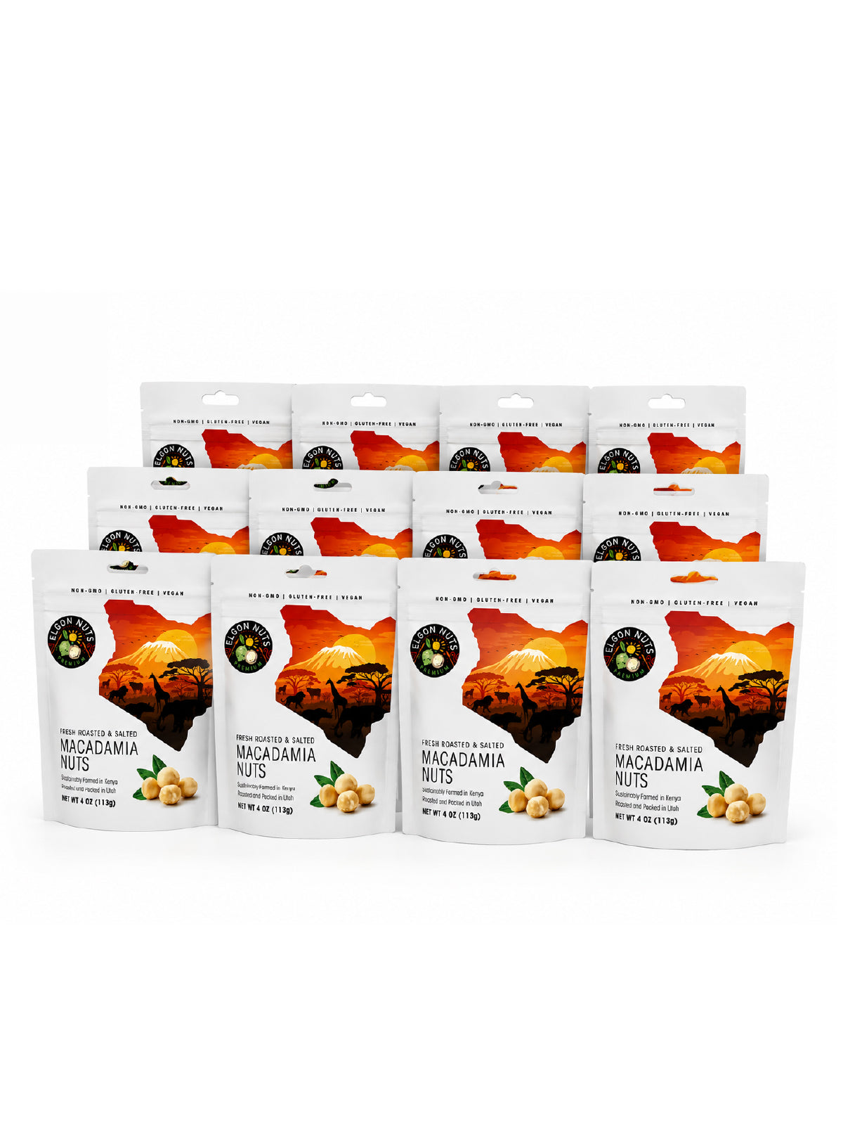 Twelve 4 oz bags of Elgon Nuts roasted and salted macadamia nuts arranged in three rows.