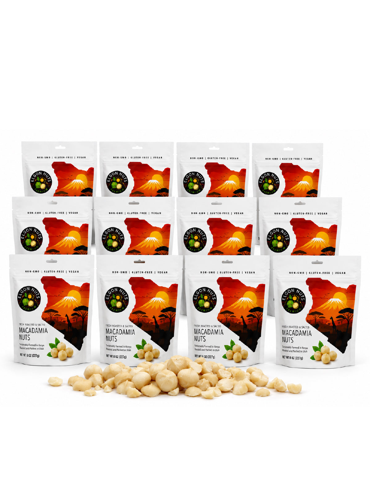 Twelve 8 oz bags of Elgon Nuts roasted and salted macadamia nuts displayed with loose macadamia nuts.